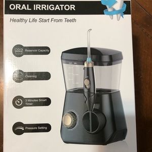 Oral irrigator - toothbrush and flosser